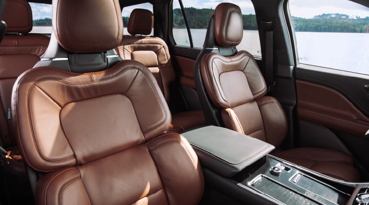 The front row's Perfect Position Seats in a 2024 Lincoln Aviator® Reserve model with Ebony Roast interior | Klaben Lincoln of Warren in Warren OH