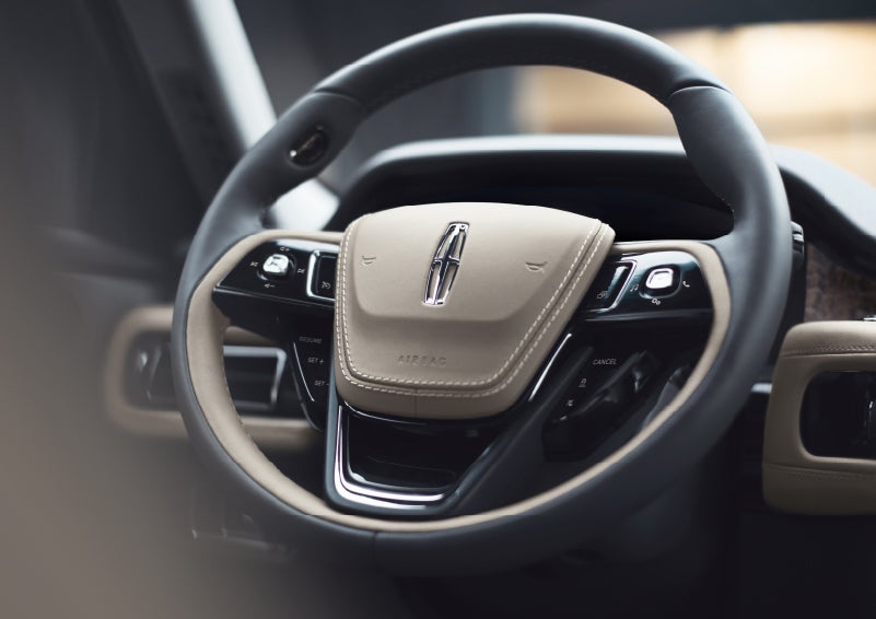 The intuitively placed controls of the steering wheel on a 2024 Lincoln Aviator® SUV | Klaben Lincoln of Warren in Warren OH
